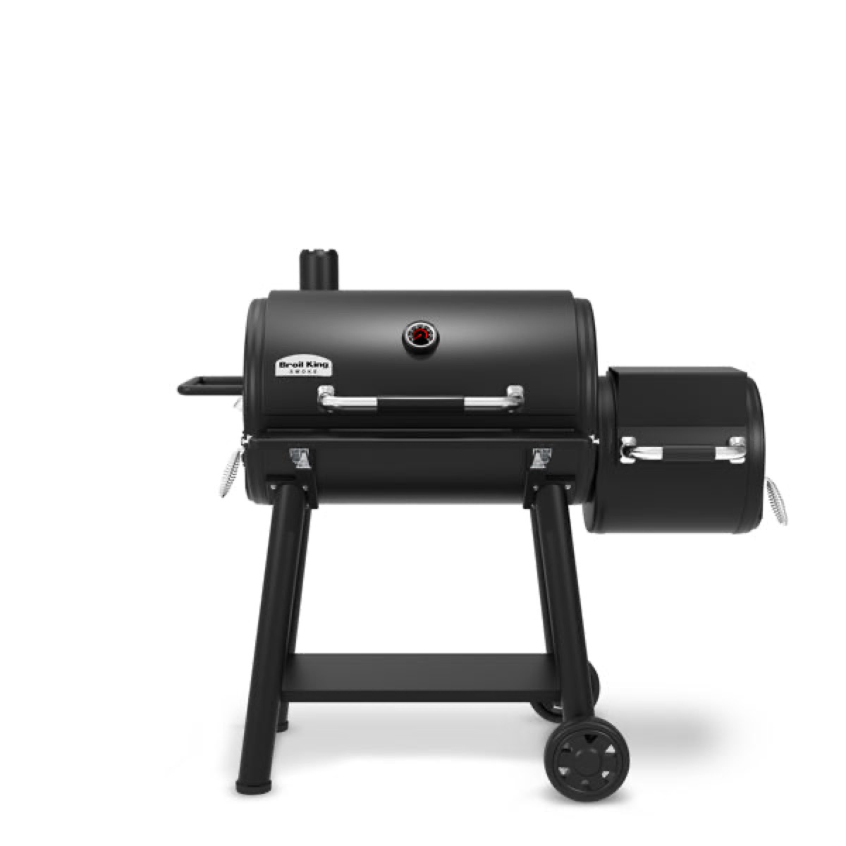 Broil King Regal Charcoal Offset 500: a black barrel charcoal grill with a smaller offset barrel on the right, on a black cart